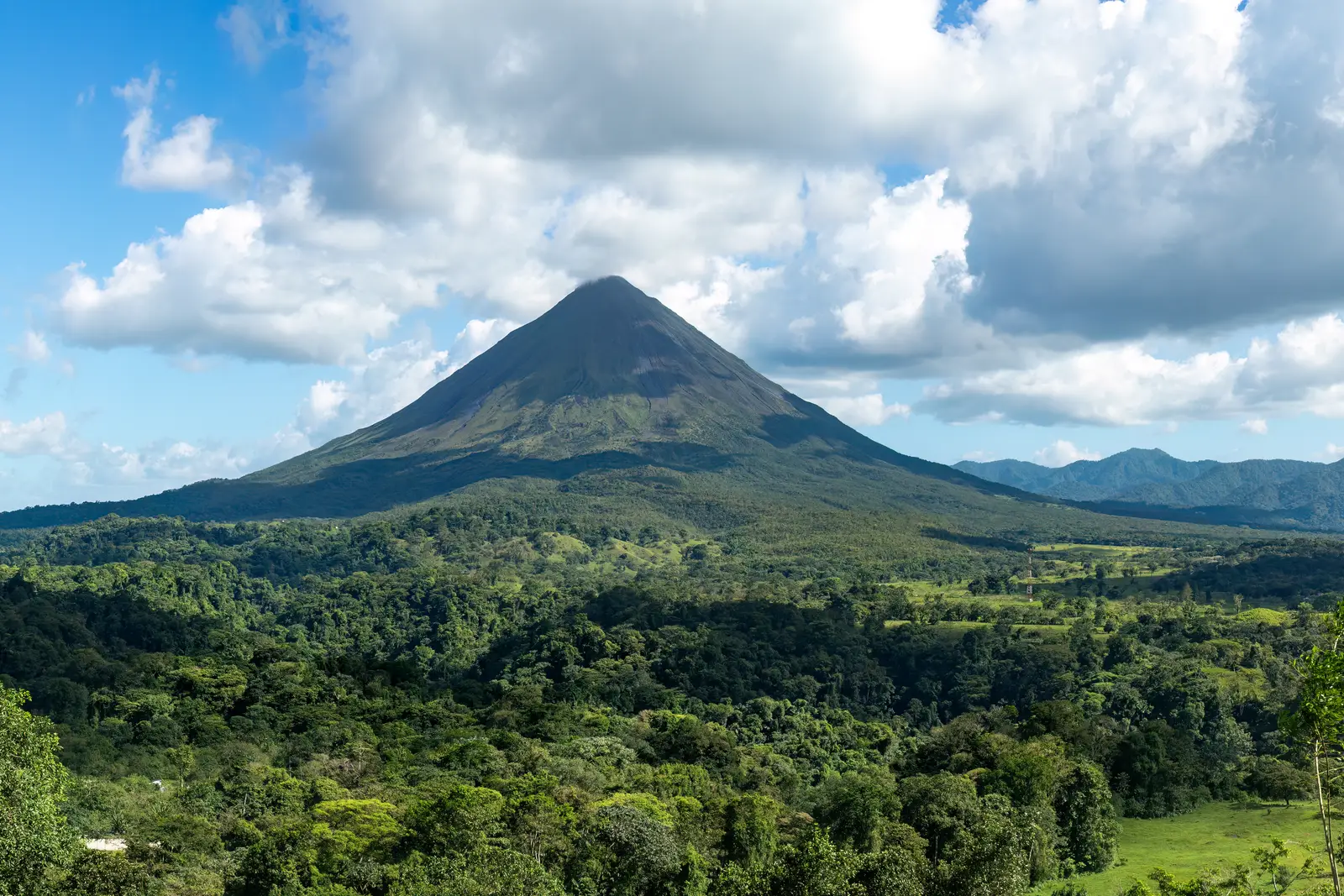 The Arenal volcano rising above the rainforest, Costa Rica.